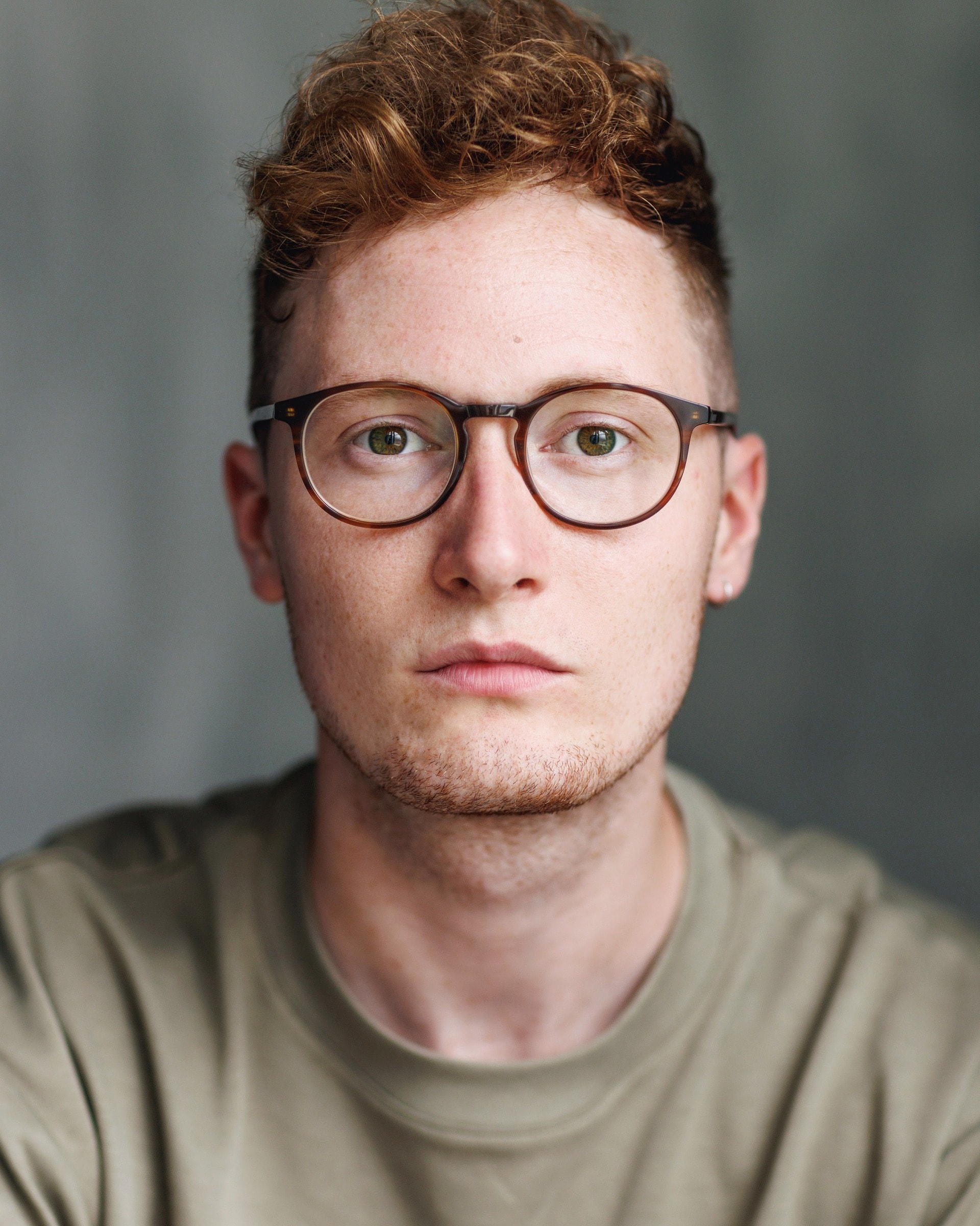Seb Yates-Cridland headshot with glasses